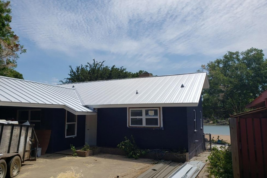 house-with-silver-metal-roof-granite-shoals-tx
